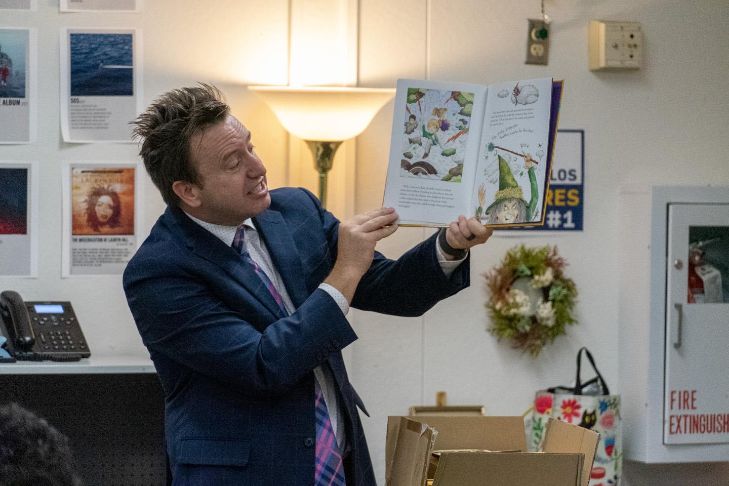 Maricopa County School Superintendent Steve Watson reading Alice and Greta by Steven J. Simmons to Ms. McEvoy's 7th-grade class at Garfield Elementary School.
