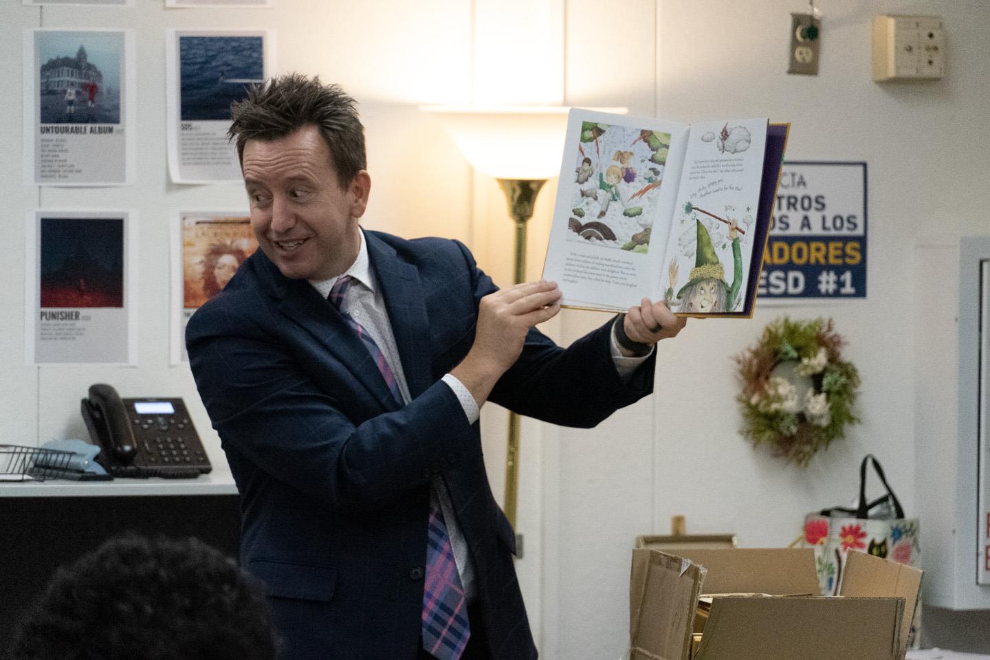 Maricopa County School Superintendent Steve Watson reading Alice and Greta by Steven J. Simmons to Ms. McEvoy's 7th-grade class at Garfield Elementary School.