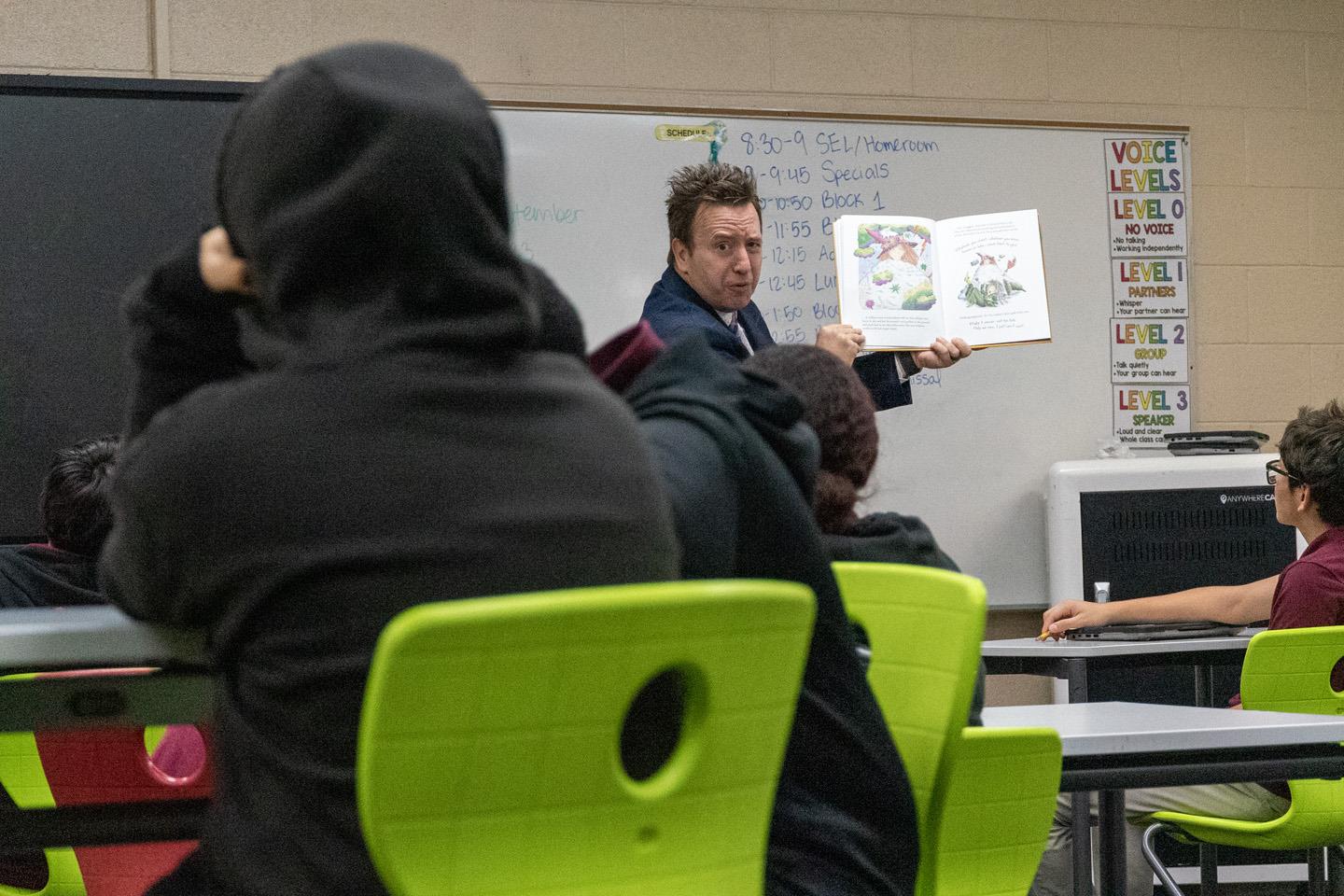Maricopa County School Superintendent Steve Watson reading Alice and Greta by Steven J. Simmons to Ms. McEvoy's 7th-grade class at Garfield Elementary School.