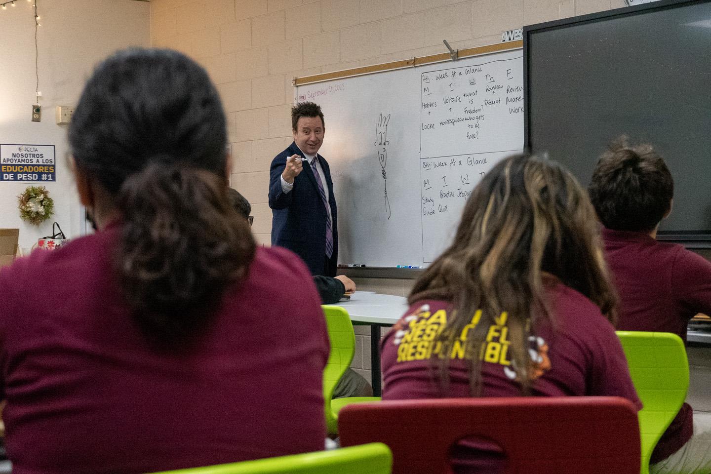 Maricopa County School Superintendent Steve Watson reading Alice and Greta by Steven J. Simmons to Ms. McEvoy's 7th-grade class at Garfield Elementary School.
