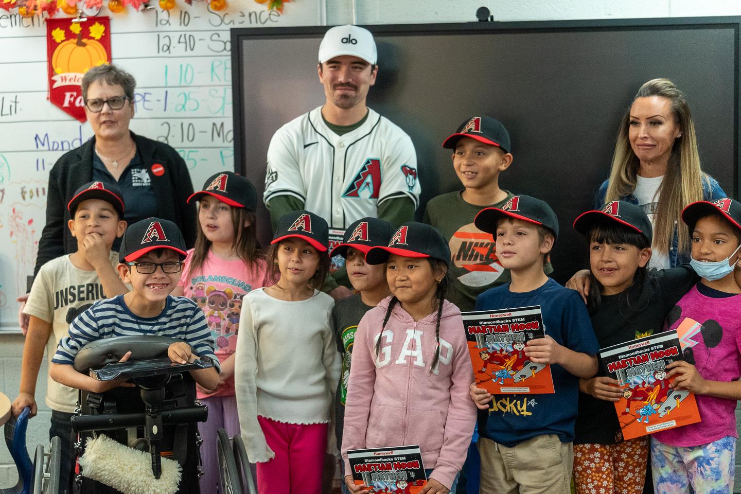The class couldn’t contain their excitement as they posed for a group photo with the 2023 Diamondbacks Rookie of the Year.