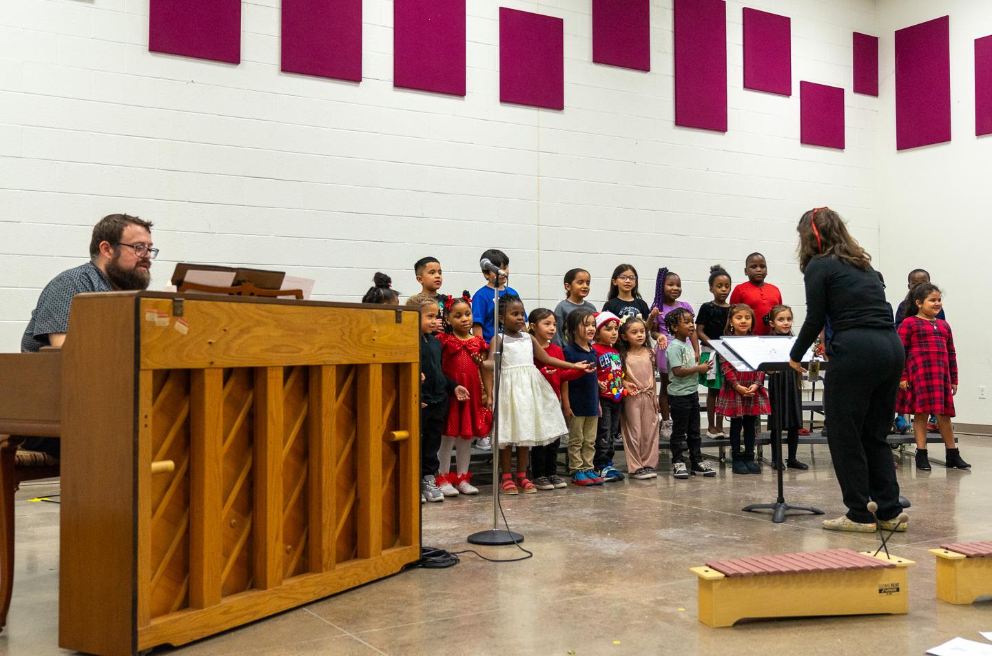 Our youngest students lit up the stage with their sweet singing, accompanied by their teacher on piano—a performance full of heart and joy