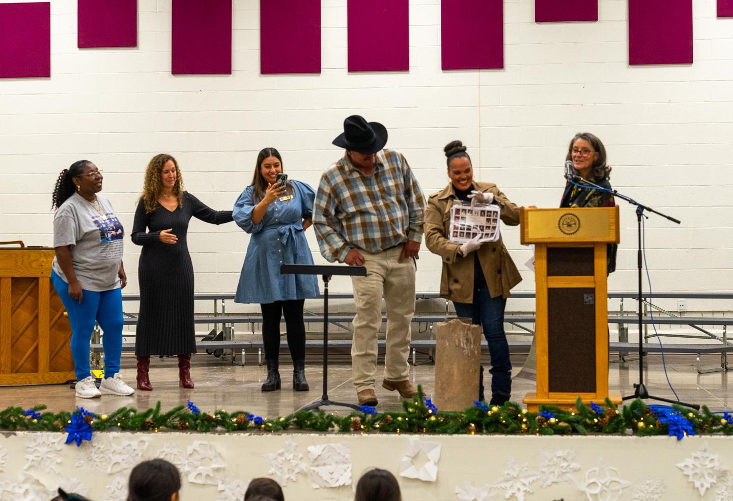 Alumni who created the 1987 time capsule beam with joy as they reconnect with their elementary school memories.