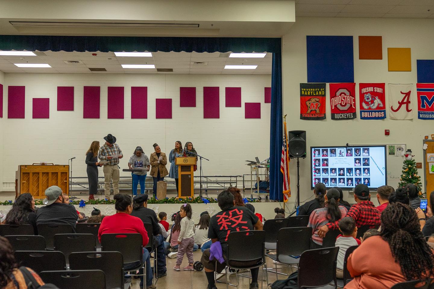Students, families, and alumni gathered to watch a slideshow featuring Dunbar yearbook pages and historic images—a beautiful reflection of the school’s rich legacy!